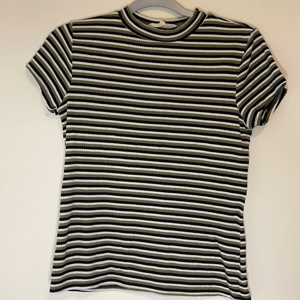 Black, white and green stripped top.